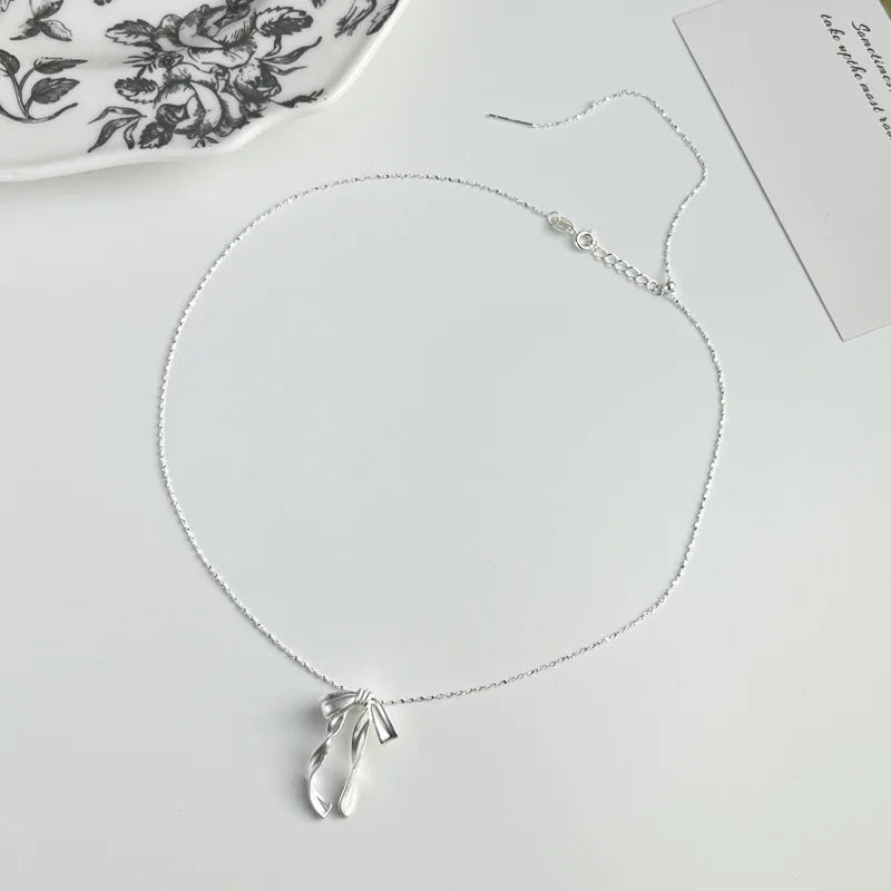 THE ETHEREAL RIBBON BOW